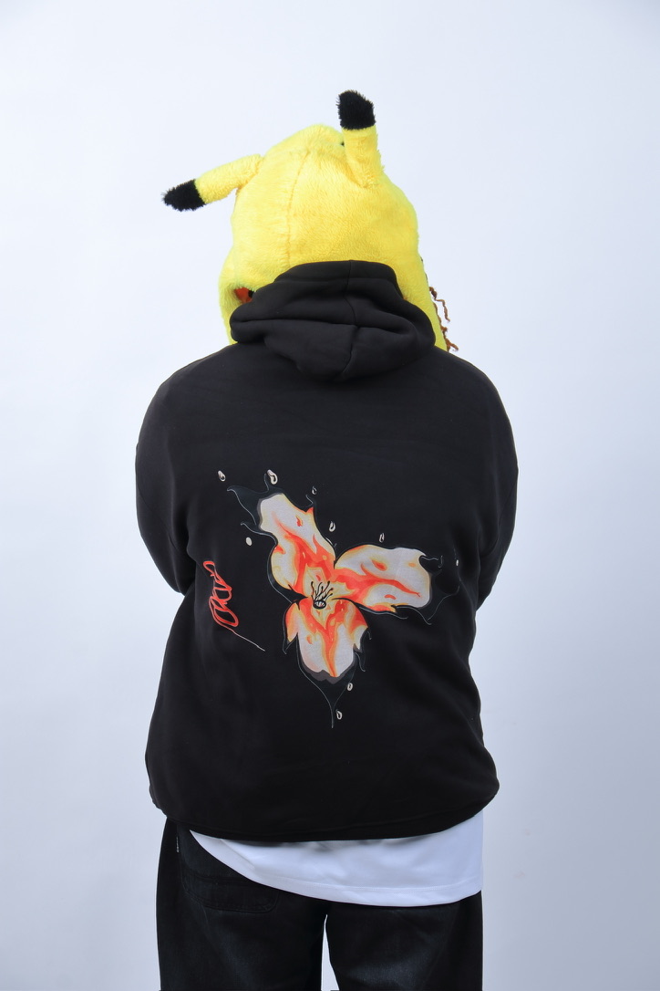 Flaming Flower — Black garment photographed